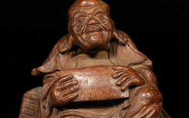 A BAMBOO CARVED ARHAT STATUE