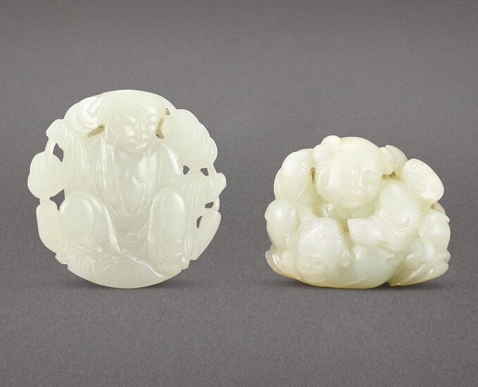 A CELADON JADE 'BOYS AND CAT' GROUP CARVING AND A JADE 'LIU HAI' BUCKLE QING DYNASTY