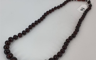 A CHERRY AMBER NECKLACE