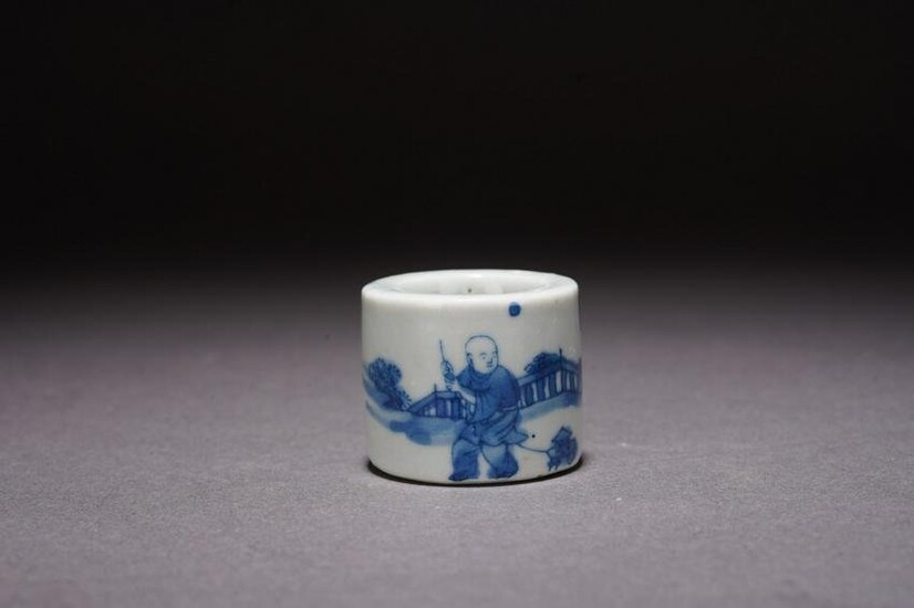 A CHINESE BLUE AND WHITE 'BOY' ARCHER'S RING