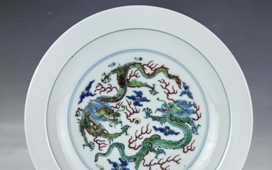 A Chinese Doucai Dragon Porcelain Plate Kangxi Mark