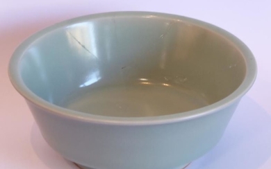 A Chinese Ming dynasty Longquan celadon glaze bowl (damaged...