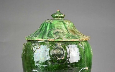 A Chinese green-glazed storage jar and cover, Ming Dynasty