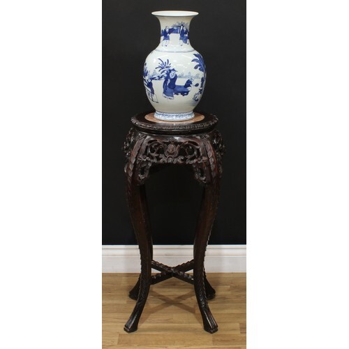 A Chinese hardwood vase or jardiniere stand, circular top wi...
