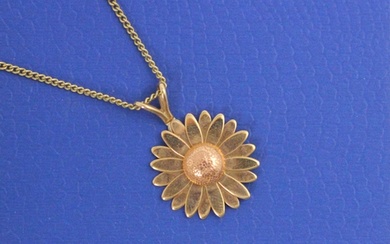 A Clogau 9ct gold ‘sunflower’ pendant, with realistic engrav...