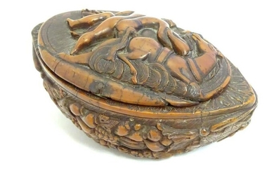 A Continental carved nut snuff box, the hinged lid