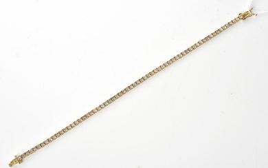 A DIAMOND LINE BRACELET, THE TOTAL DIAMOND WEIGHT ESTIMATED 4.60CTS, IN 18CT GOLD, LENGTH 185MM, 7.7GMS