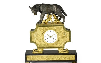 A DIRECTOIRE GILT AND PATINATED BRONZE AND MARBLE MANTEL CLOCK DEPICTING THE TALE OF ROMULUS AND REMUS, CIRCA 1800