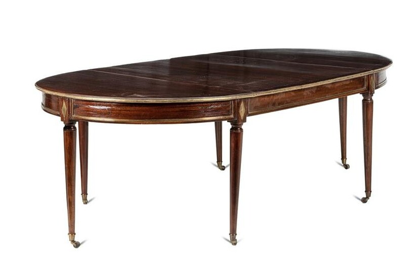 A Directoire Brass Mounted Mahogany Dining Table