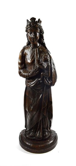 A French Carved Oak Figure of the Madonna and Child, probably Normandy, 17th century, she wearing a
