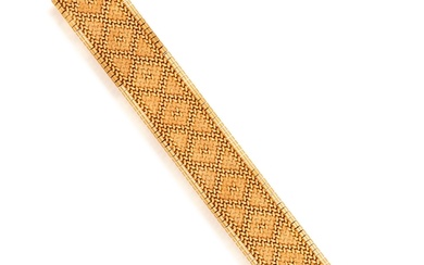 A GOLD BRACELET, FRENCH, CIRCA 1965 The textured and polish...