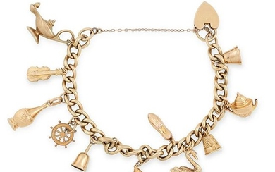 A GOLD CHARM BRACELET set with various charms including