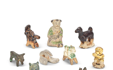 A GROUP OF SIX POTTERY FIGURES AND THREE BRONZE ANIMALS...