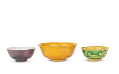 A GROUP OF THREE VARIOUS 'DRAGON' BOWLS The aubergine-glazed bowl...