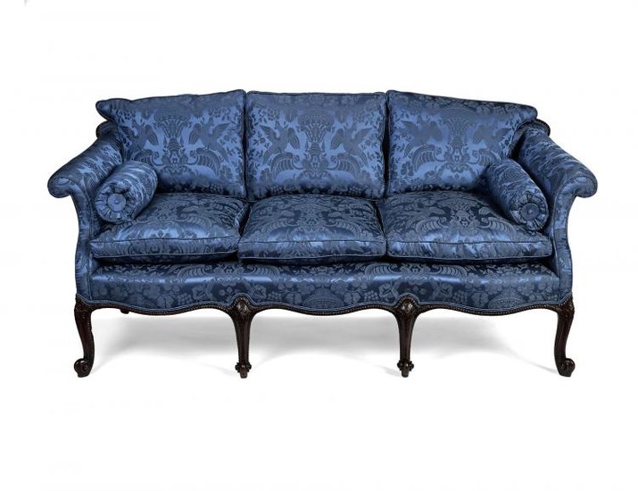 A George III style carved mahogany sofa, late 19th/early 20th century