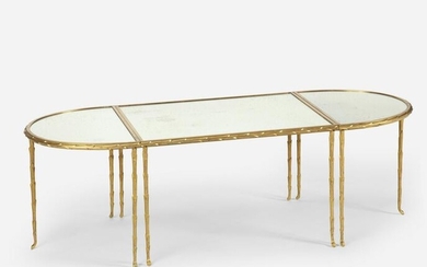 A Hollywood Regency-style mirrored and gilt-bronze