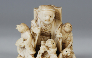 A Japanese carved and stained ivory netsuke, Meiji/Taisho period, modelled to represent the fable Sh