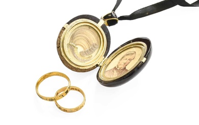 A Jet Mourning Locket, the locket carved with foliate decoration...