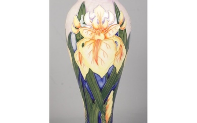 A Moorcroft pottery vase decorated in the Windrush design. D...
