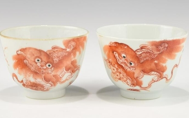 A PAIR OF CHINESE IRON RED LION CUPS