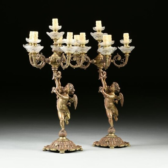 A PAIR OF FRENCH GILT BRONZE SEVEN LIGHT FIGURAL