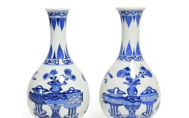 A Pair of Chinese Porcelain Bottle Vases, Kangxi, painted in...