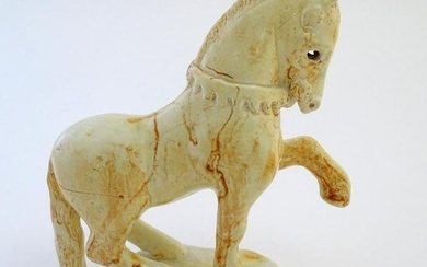 A Paula Humphries studio pottery model of a horse on an