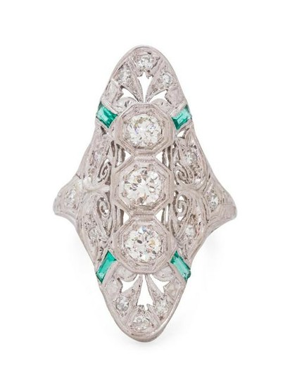 A Platinum, Diamond and Emerald Ring