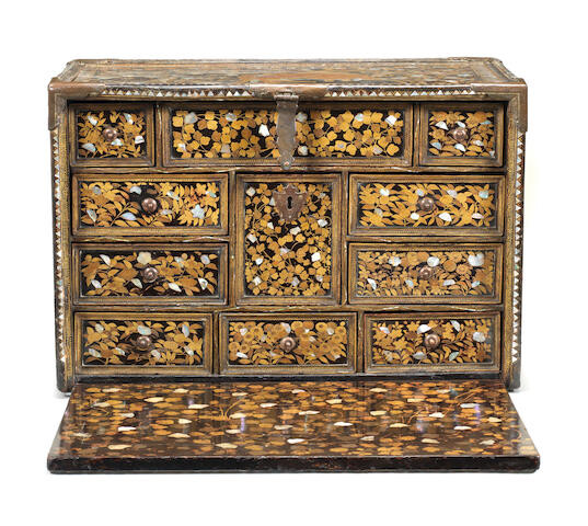 A RARE GILT-COPPER-MOUNTED SHELL-INLAID NANBAN LACQUER CABINET