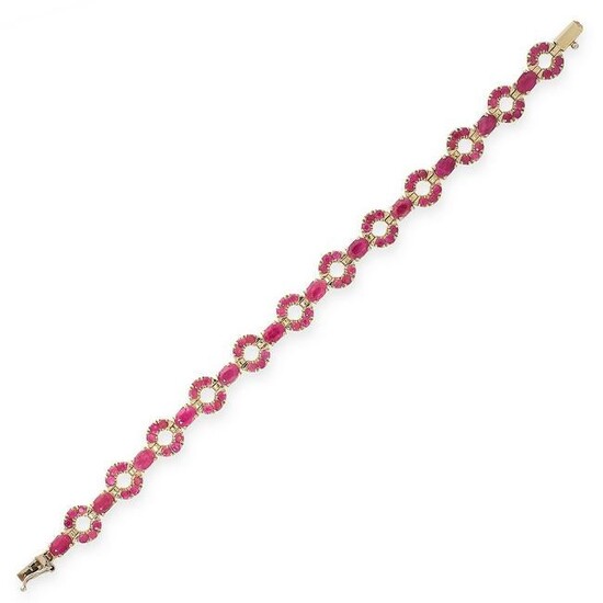 A RUBY BRACELET in 14ct yellow gold, designed as an