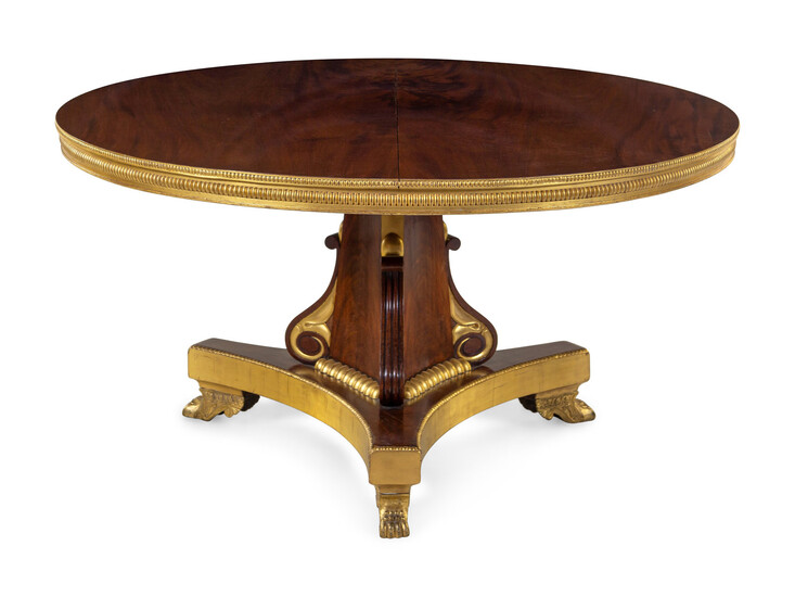A Regency Parcel Gilt Mahogany Center Table