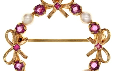 A Ruby and Pearl Brooch The circular ribbon-twist design set with eight small rubies, intersper...