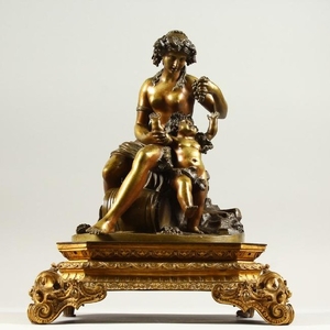 A SUPERB FRENCH BRONZE GROUP OF A SEMI-NAKED WOMAN
