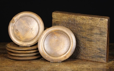 A Set of Six Swedish Treen Plates with moulded borders, branded underneath with initials J.O.J.S., a