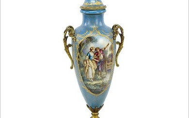 A Sevres Style Painted and Gilt Porcelain Urn.