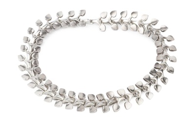 A Swedish silver choker necklace, composed of interlocking stylised twin...