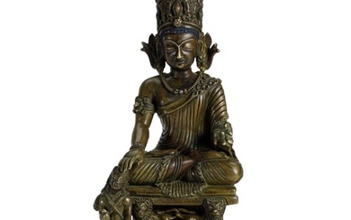 A TIBETAN SILVER INLAID ALLOY COPPER FIGURE OF SEATED BUDDHA
