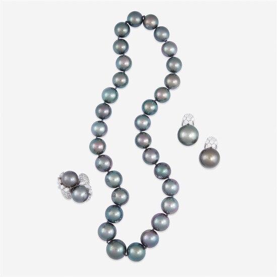 A Tahitian black cultured pearl, diamond, and eighteen karat...