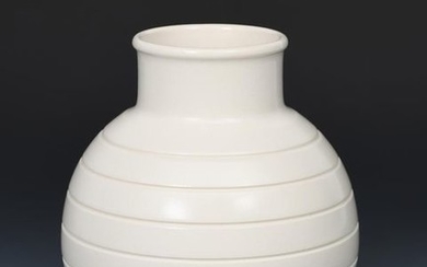 A Wedgwood Moonstone vase designed by Keith Murray,...