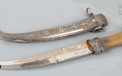 A beautiful and ancient dagger with a rhino horn handle...