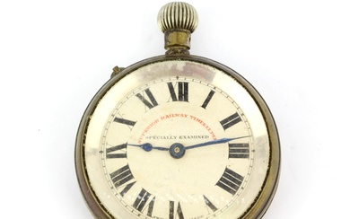 A brass 'Superior Railway Timekeeper' pocketwatch.
