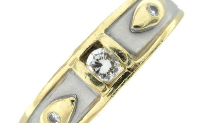 A brilliant-cut diamond three-stone band ring.