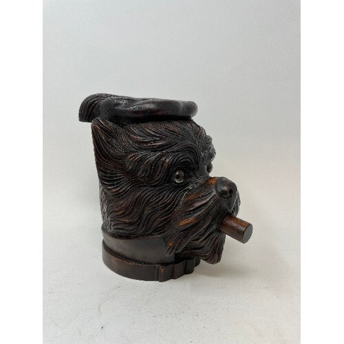 A carved wood tobacco box and cover, in the form of a dog, 1...