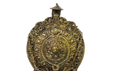 A cast brass Russian powder flask and cover. 19th century, e...