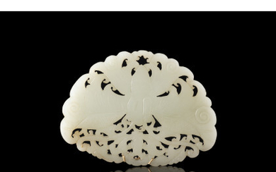 A celadon jade plaque carved as a butterfly China, mid 20th century (l. 10.6 cm.)
