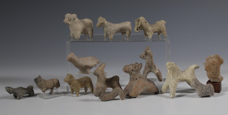 A collection of fourteen various terracotta animal figures, some of Near Eastern antiquties, ca. 2nd...