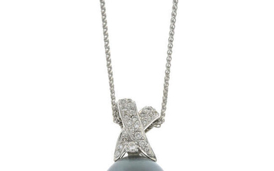 A cultured pearl and brilliant-cut diamond pendant, with chain.
