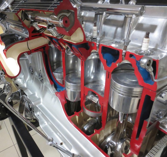 A cut-away 4.2 litre Jaguar 6 cylinder dohc fuel injected engine