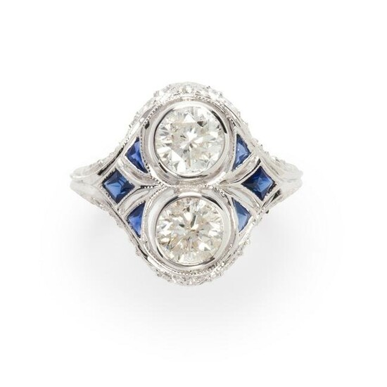 A diamond, sapphire and eighteen karat white gold ring