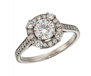 A diamond single stone ring, the circular-cut...